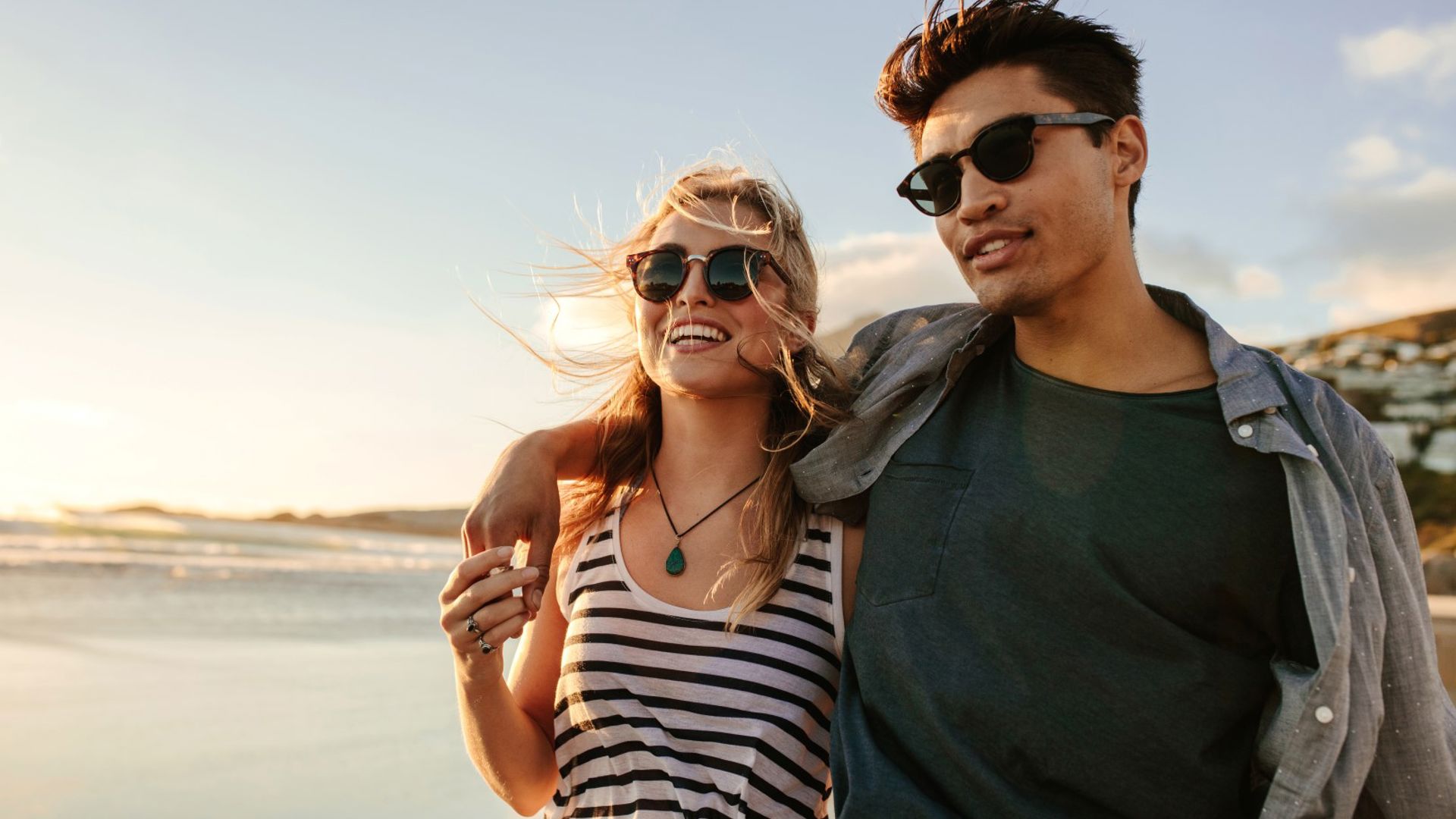 Cool couple enjoying the protection of their GMHBA Eye Care sunglasses