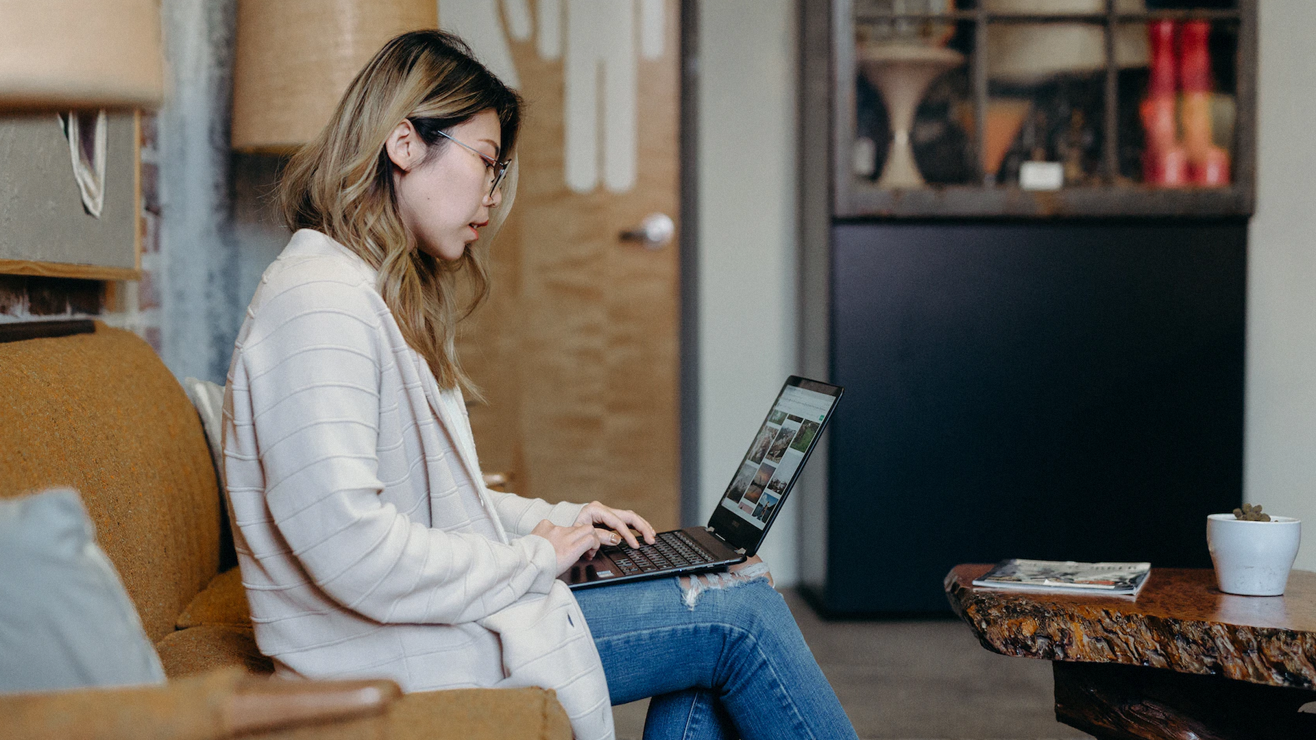 woman looking at laptop for out of pocket costs
