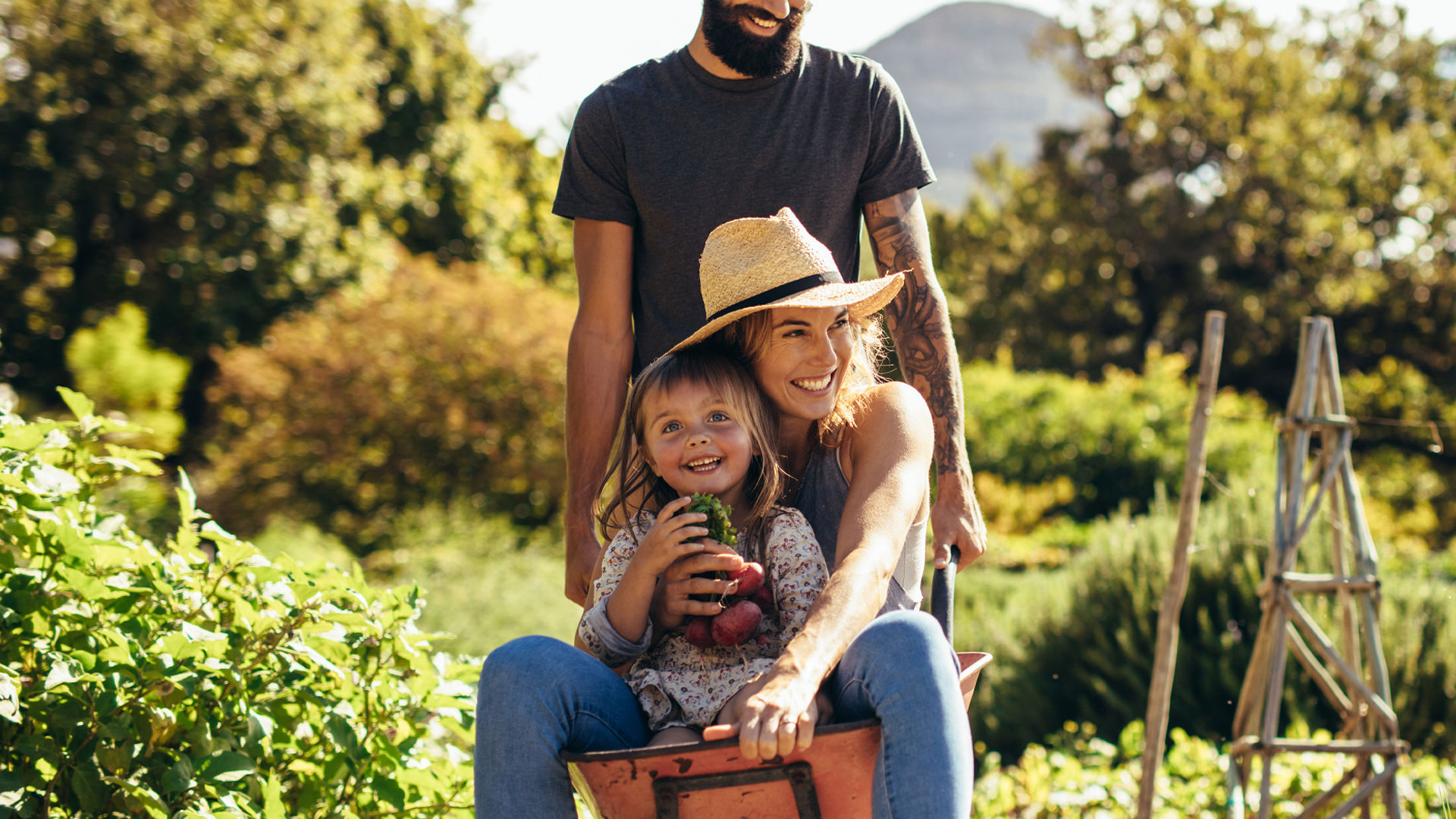 Dad and kids gardening